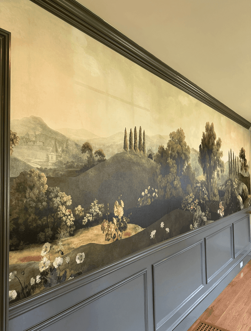 Panoramic scenic mural over wainscoting