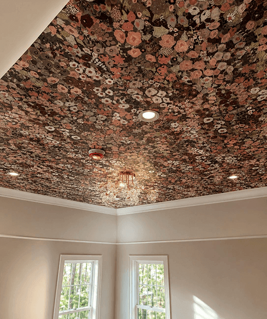 Floral wallpaper installed on ceiling