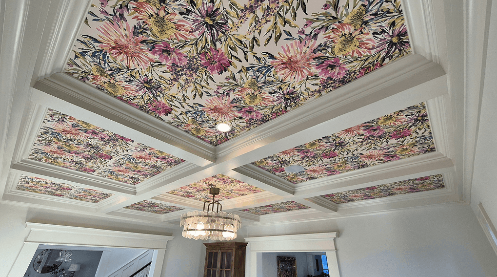 Coffered ceiling with floral wallpaper panels
